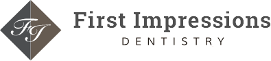 A logo for "First Impressions Dentistry" featuring a diamond shape on the left with stylized "FI" lettering inside. To its right, "First Impressions" is displayed in bold serif font, and "DENTISTRY" appears in smaller sans-serif text below.